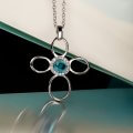 Aqua and diamond cross pendant