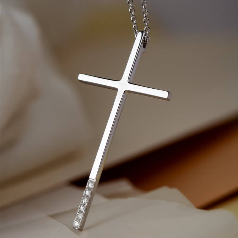 Minimal white gold cross with diamond edge