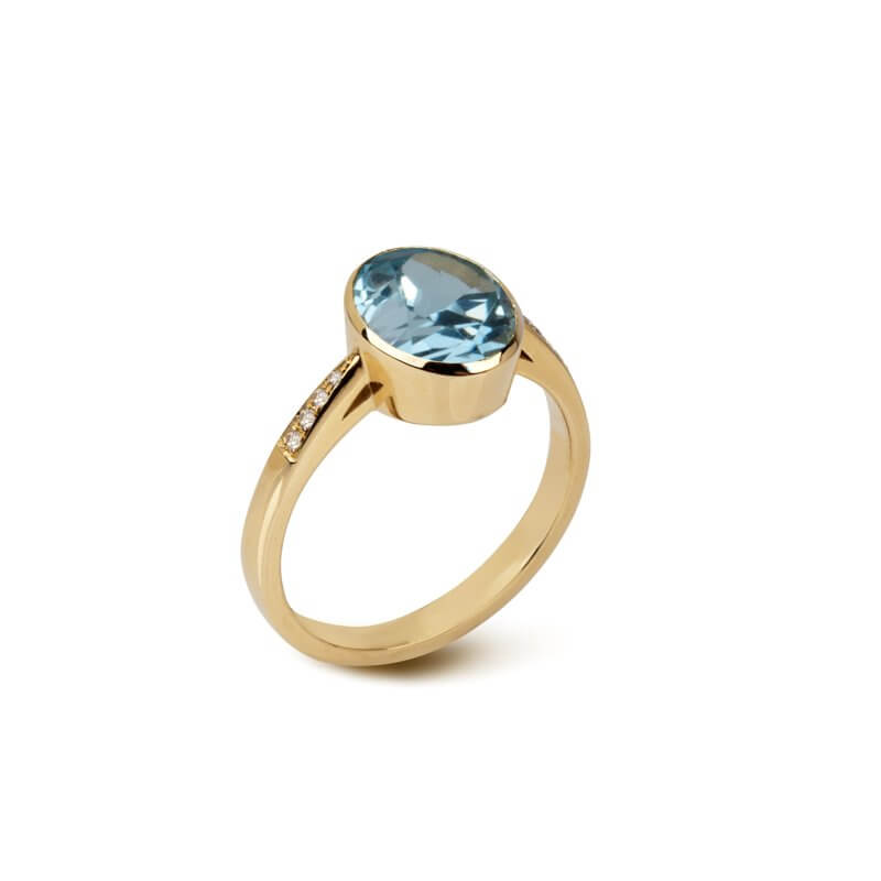 Blue topaz ring with diamonds