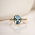 Blue topaz ring with diamonds