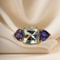 Three-stone ring with aquamarine and tanzanites
