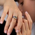 Three-stone ring with aquamarine and tanzanites