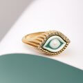 Eye-shaped carved agate ring